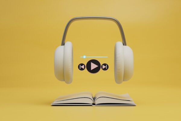 Modern,Technologies.,Listening,To,An,Audiobook,With,Headphones.,Headphones,,Audiobook
