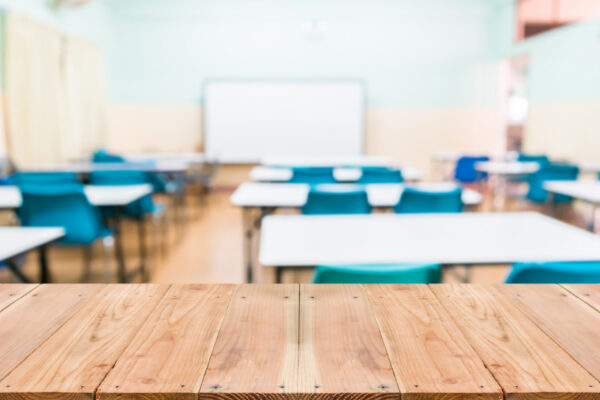 Look,Out,From,The,Table,,Blur,Image,Of,Empty,Classroom