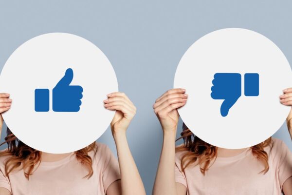 Like,Dislike,Concept.,Choose,Between,Like,And,Dislike.,Woman,Holding