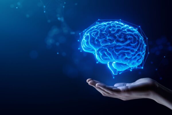 Hand,Holding,Human,Brain,-,Futuristic,Concept,Of,Intelligence,,Science