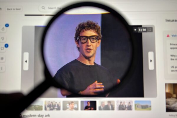 Close,Up,Of,Magnifying,Lens,Focusing,On,Digital,Display,Showing